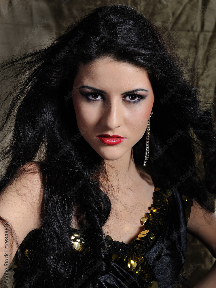 Beautiful model woman with long black healthy hair in arabic tra Stock ...