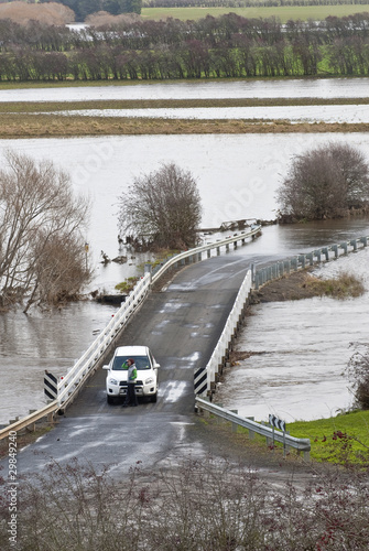 Stranded driver, Macquarie river in flood, Tasmania, Australia