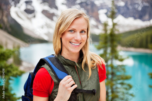 Beautiful female hiker smiling © Tyler Olson