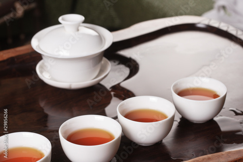 Teapot, cups and tea
