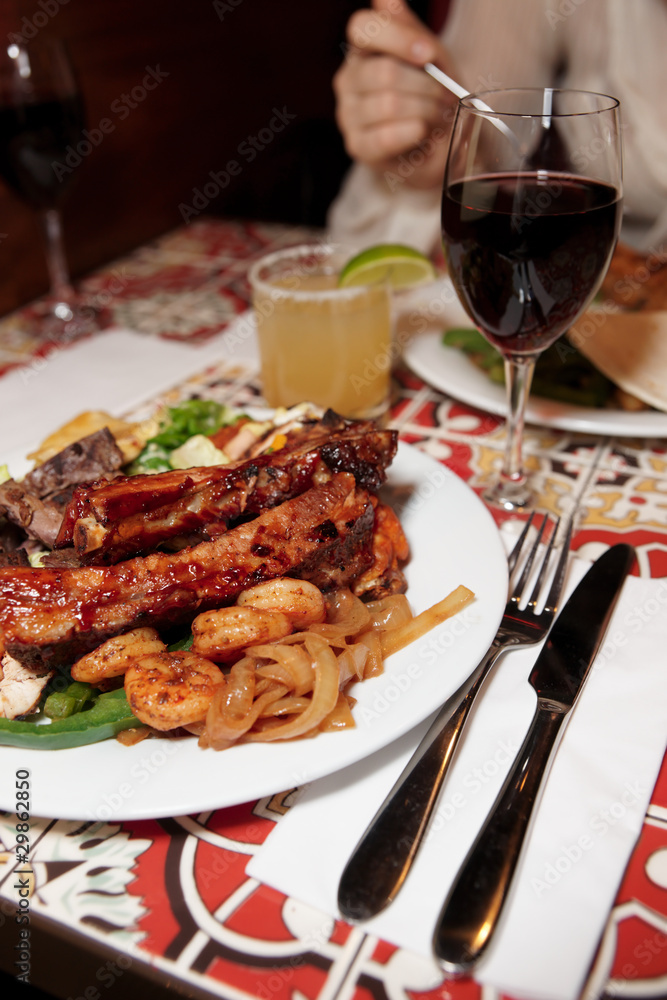 Grilled pork ribs, beef and shrimps