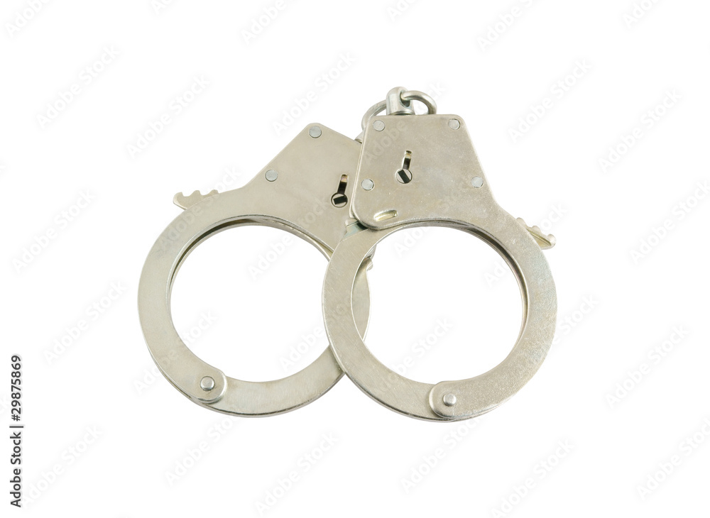 Steel metallic handcuffs isolated on white background Steel metallic handcuffs isolated on white background