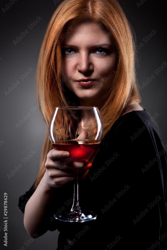 woman with red hair holding wine glass woman with red hair holding wine glass