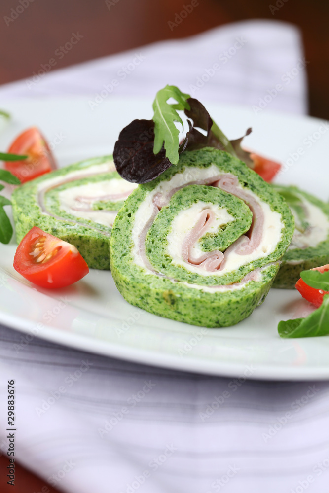 Spinach roll with garlic cheese and ham. Shallow dof Spinach roll with garlic cheese and ham. Shallow dof