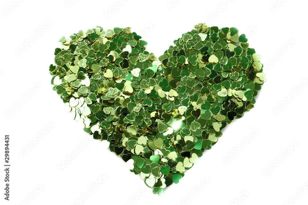 Green hearts in the form of confetti on white Green hearts in the form of confetti on white