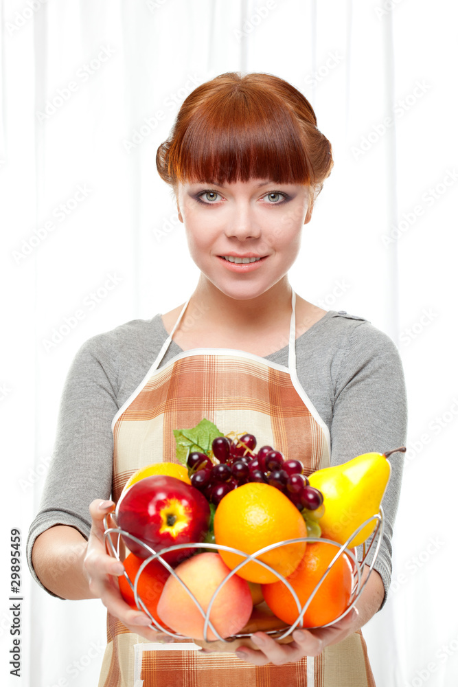 ginger housewife holding fruits ginger housewife holding fruits
