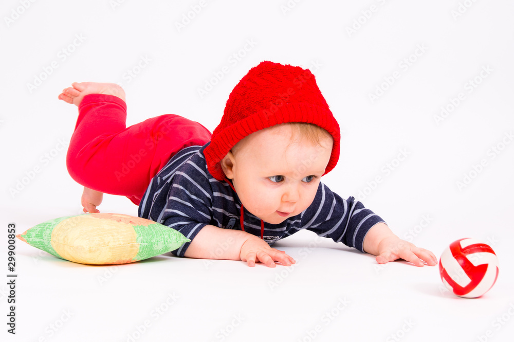 Little child baby crawling for the red ball Little child baby crawling for the red ball