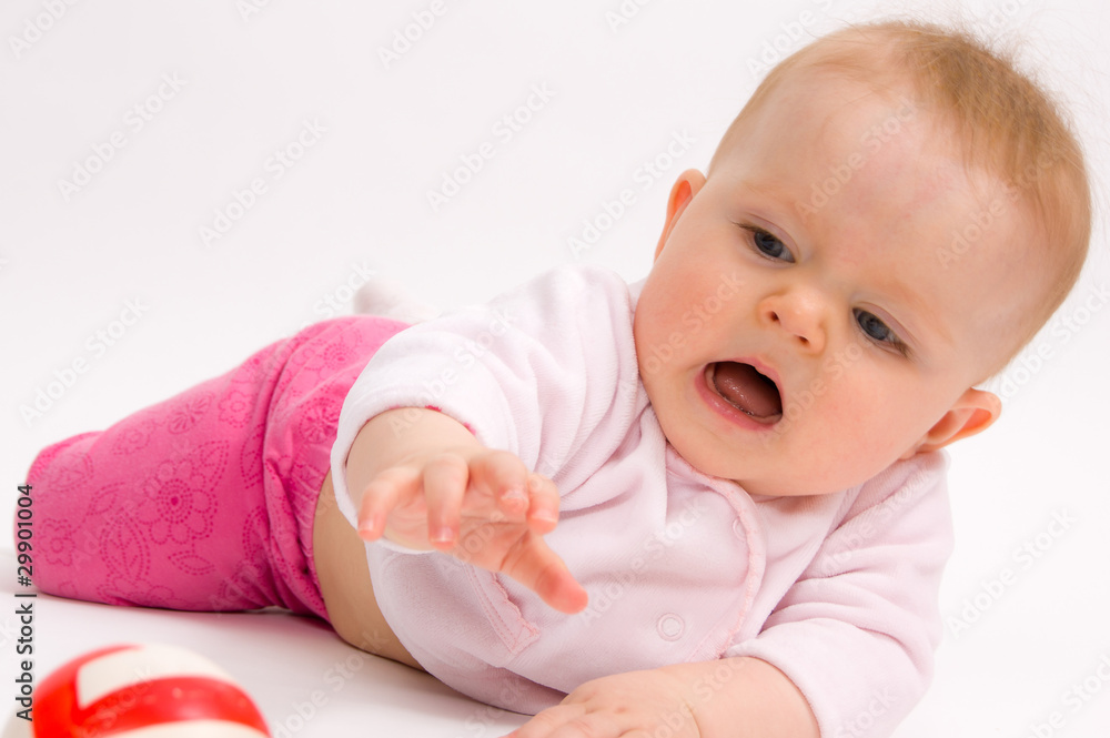 Little child baby crawling for the red ball Little child baby crawling for the red ball