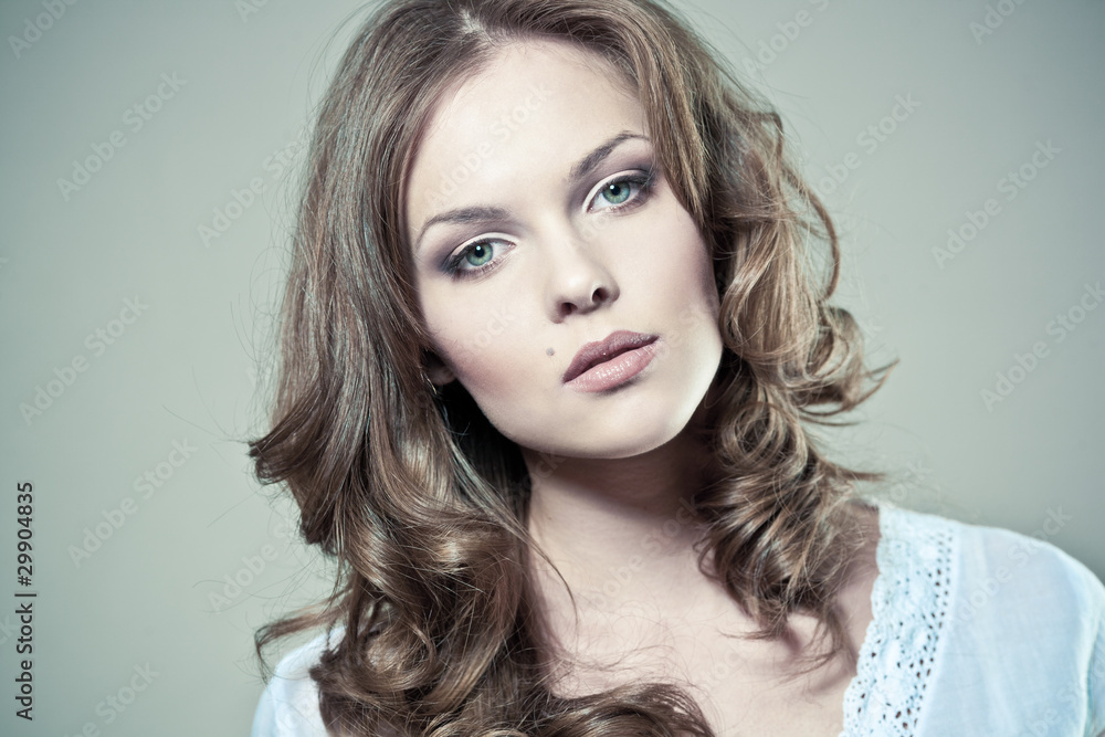 Fototapeta premium Beautiful young woman with natural makeup and perfect skin