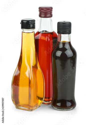 Bottles with apple and red wine vinegar and soy sauce