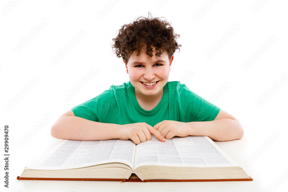 Boy reading book isolated on white Boy reading book isolated on white