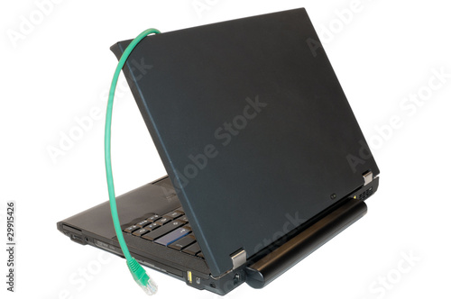Isolated black laptop with a networking cable