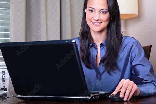 woman shops with her credit card online