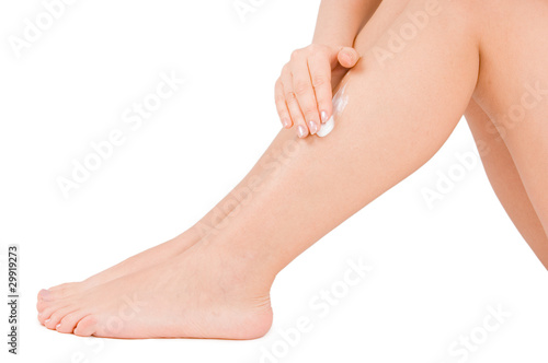 Female feet isolated on white background © Vladimir Voronin