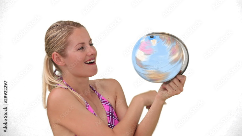 Lady in purple swimsuit chosing a destination Lady in purple swimsuit chosing a destination
