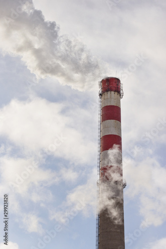 Factory pipe, emitting a cloud of white smoke
