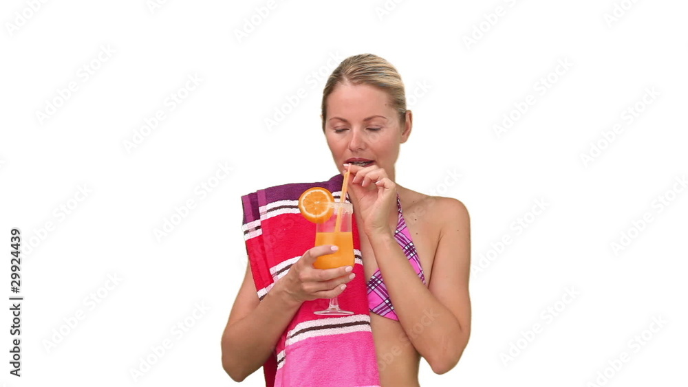 Pretty woman in swimsuit drinking cocktail Pretty woman in swimsuit drinking cocktail
