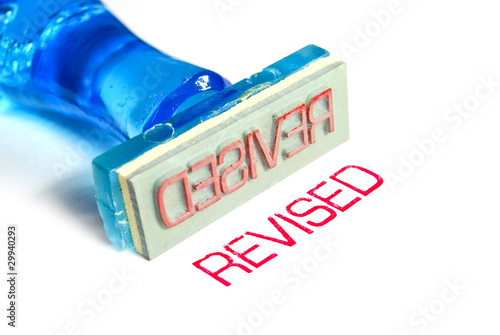 Φωτογραφία revised blue rubber stamp