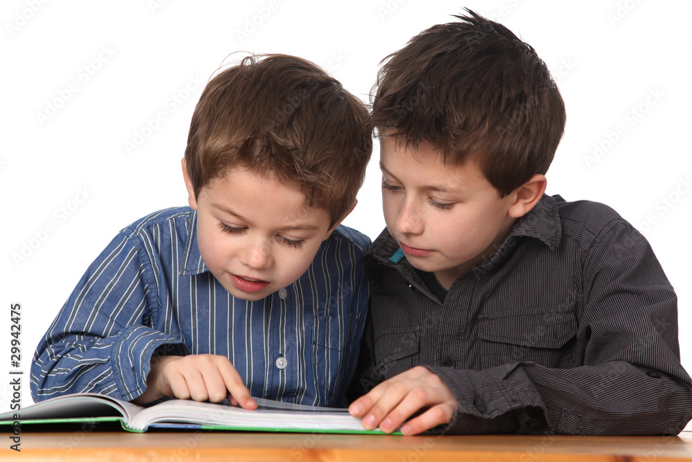 two young boys learning two young boys learning
