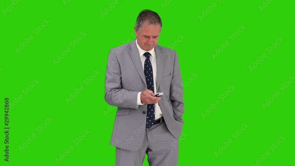 Businessman in suit with remote control Businessman in suit with remote control