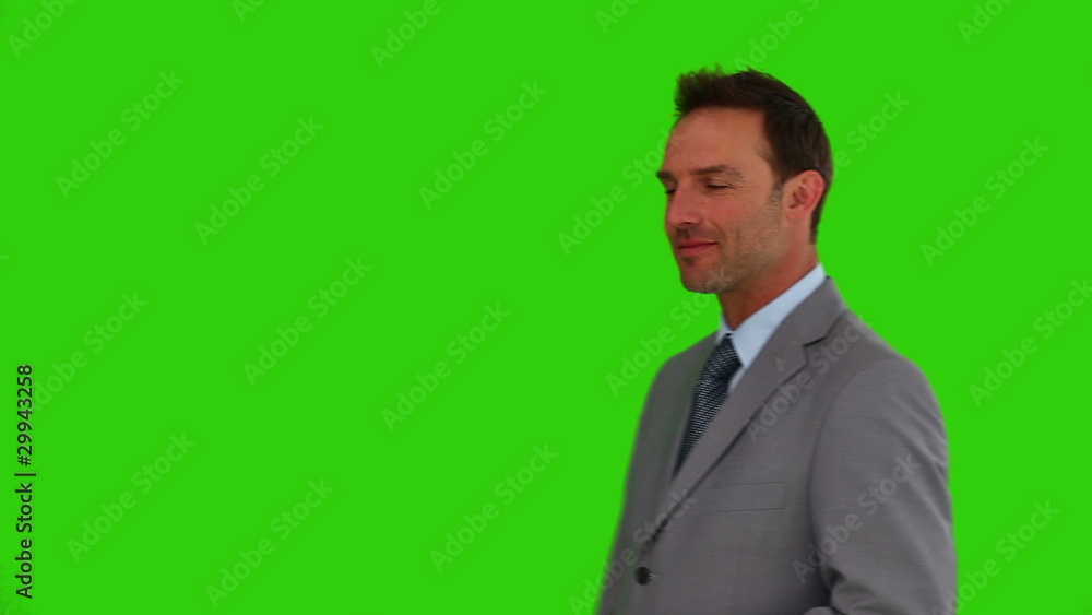 Businessman in a gray suit looking at the camera Businessman in a gray suit looking at the camera