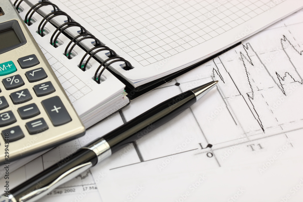 financial charts and graphs on the table