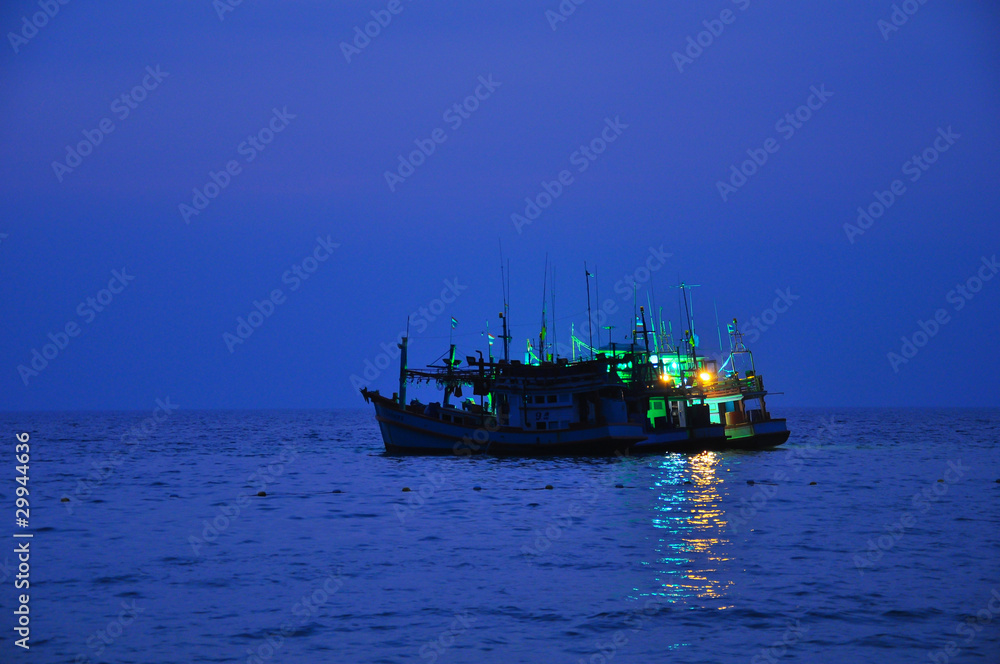 Fishing boats at night