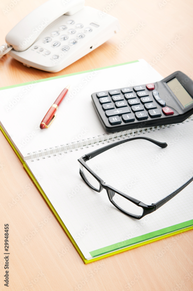 Business concept with notepad and calculator Business concept with notepad and calculator