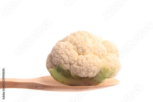 Obraz na płótnie Mini cauliflower on a wooden spoon w salonie