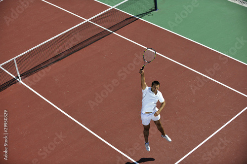 young man play tennis © .shock