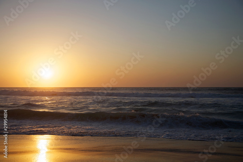 Sunset on the beach © piccaya