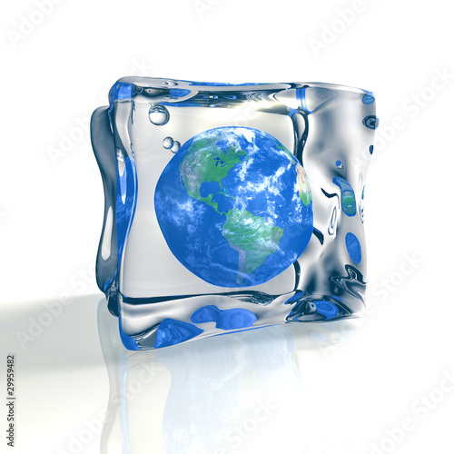 Blue earth globe trapped in ice cube photo