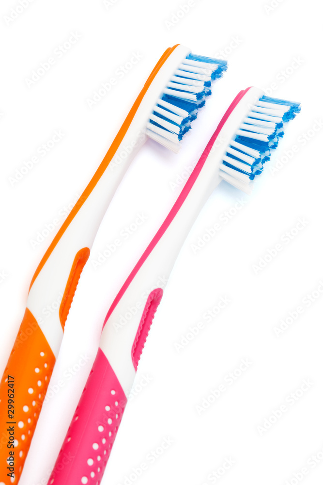 two new toothbrushes two new toothbrushes