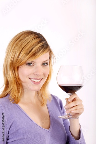 woman with a bottle wine and a wineglass