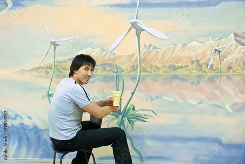 Artist painting on the wall