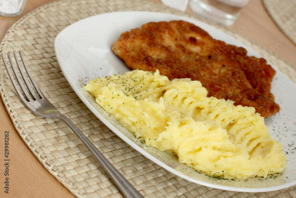 wet homemade fried chicken steak and boiled potatoes wet homemade fried chicken steak and boiled potatoes