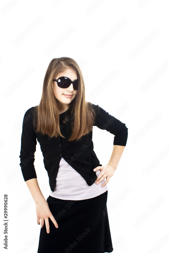 Fototapeta premium Girl in sunglasses posing on white background