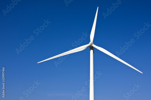 wind turbine with blue sky as background