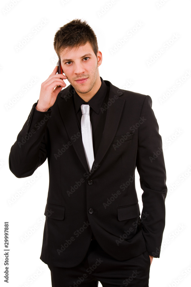 Young business man at the phone, isolated over white Young business man at the phone, isolated over white