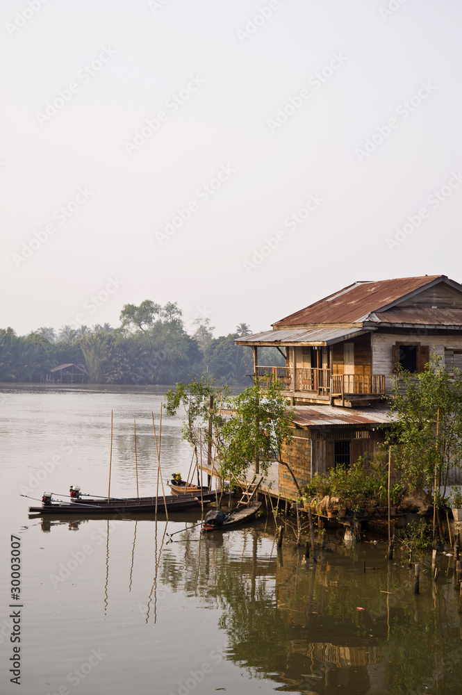 Fototapeta premium Old house near the river