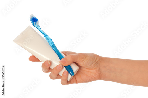 Toothpaste and blue toothbrush