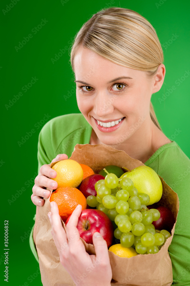 Healthy lifestyle - woman with fruit shopping paper bag Healthy lifestyle - woman with fruit shopping paper bag