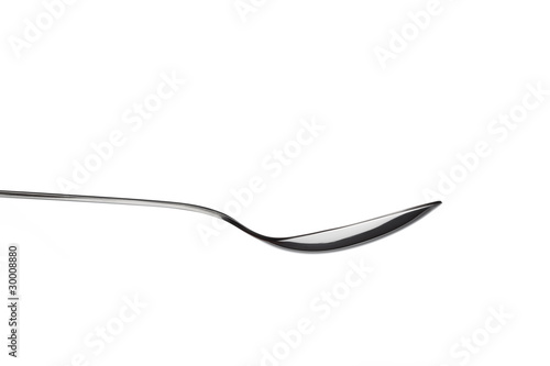 metallic spoon isolated on white