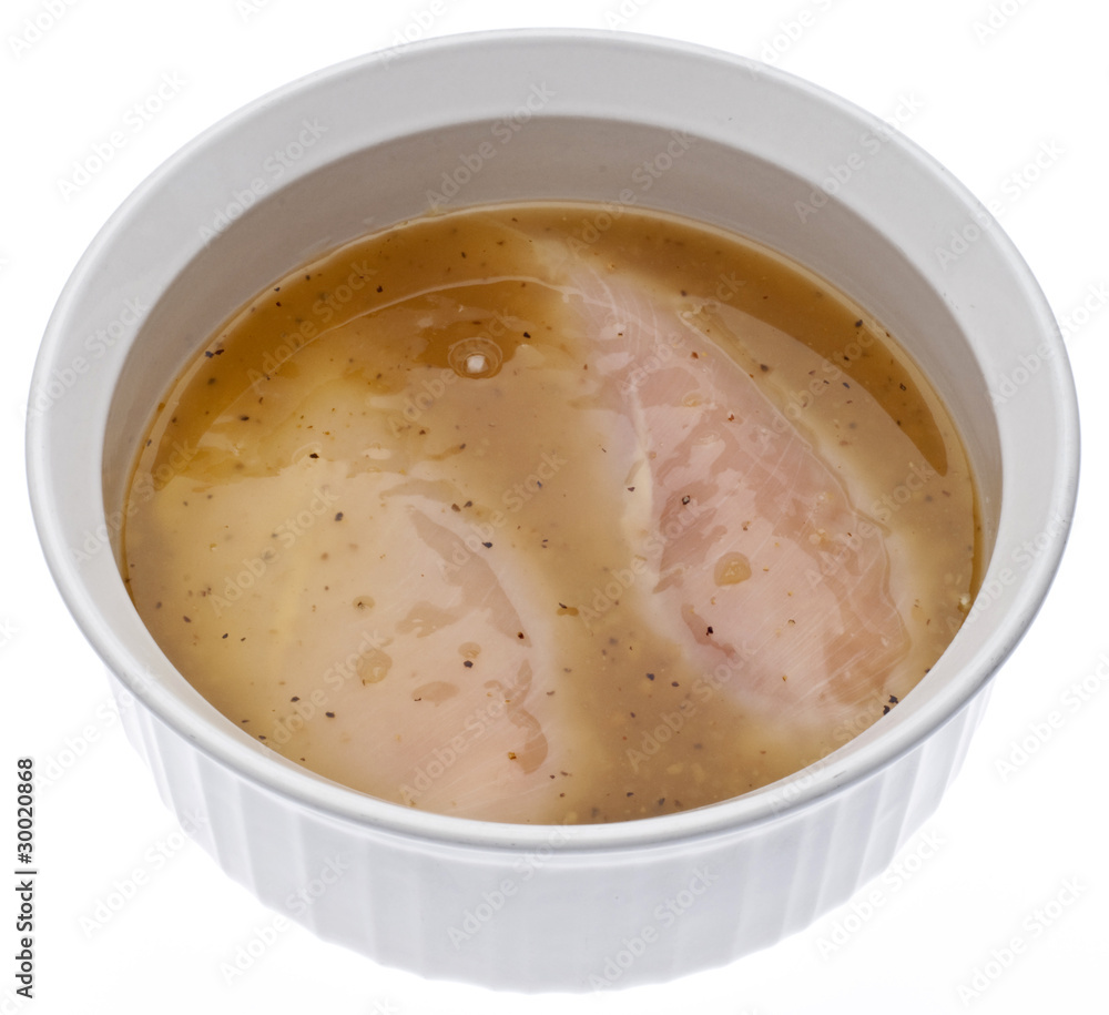 Raw Chicken in Lemon Pepper Flavored Marinade Raw Chicken in Lemon Pepper Flavored Marinade