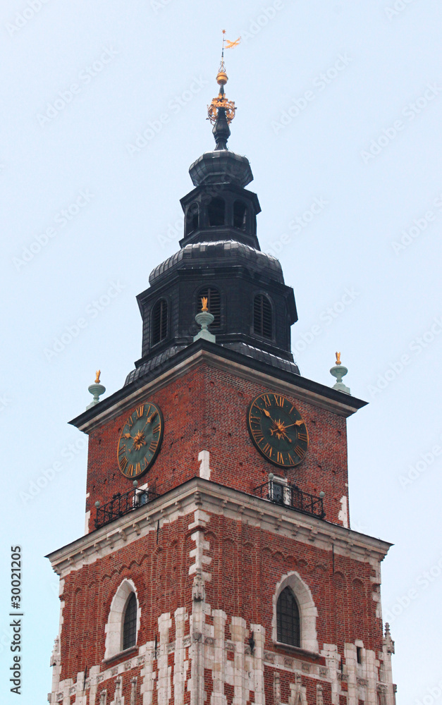 Town hall with clock in summer Krakow, Poland