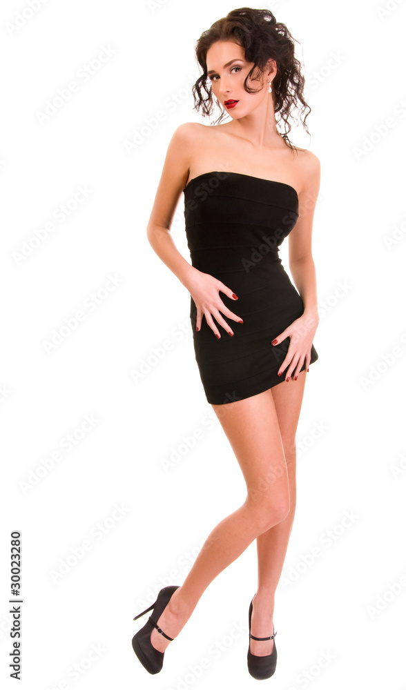Picture of lovely brunette woman in dress over white background