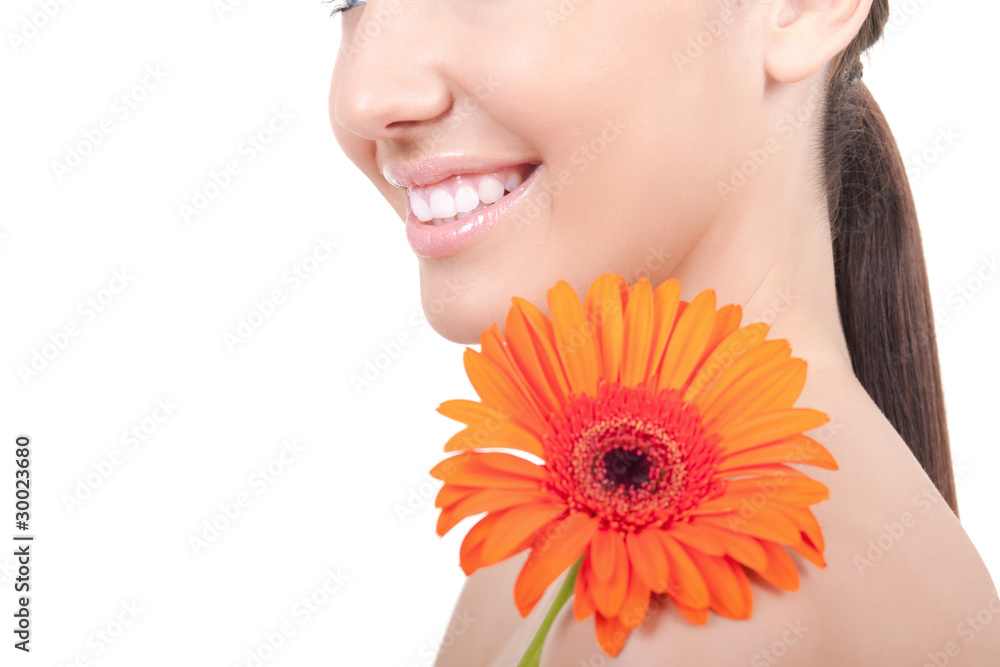woman with flower on shoulder woman with flower on shoulder