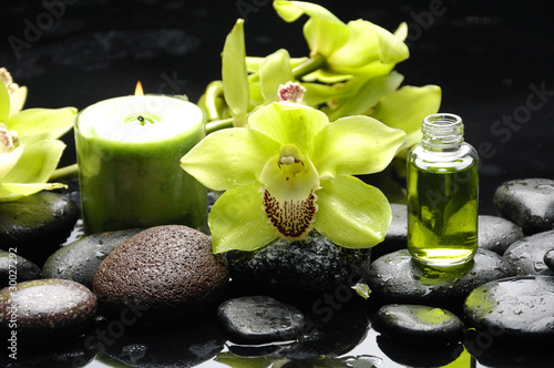 Oriental spa with orchid   candle and pebbles