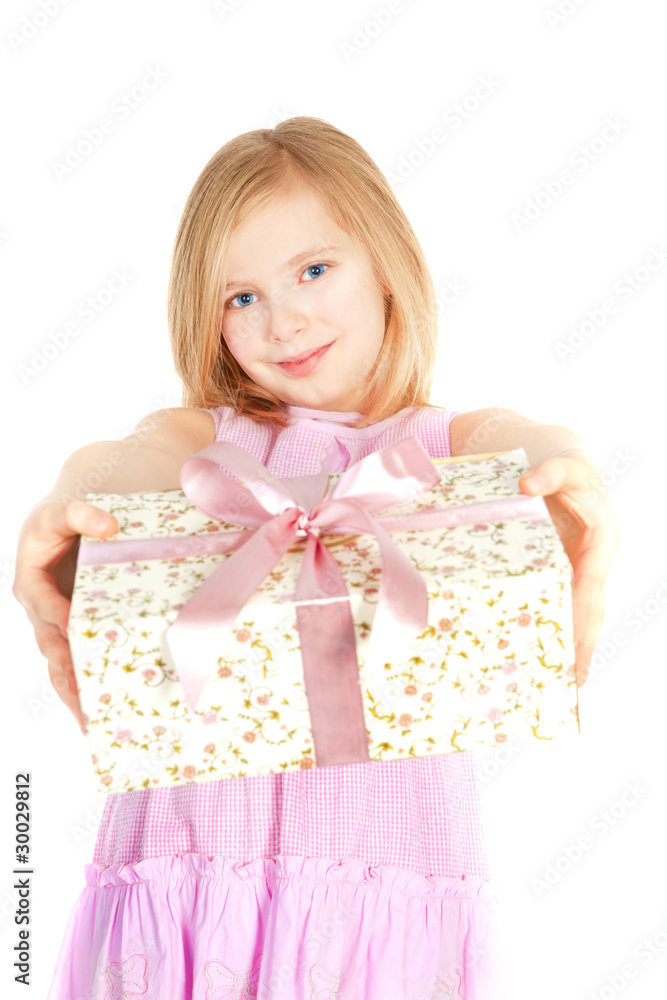 smiling girl holding present over white smiling girl holding present over white