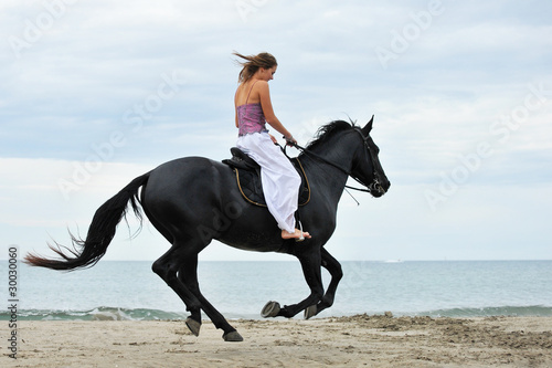 cavaliere sur la plage